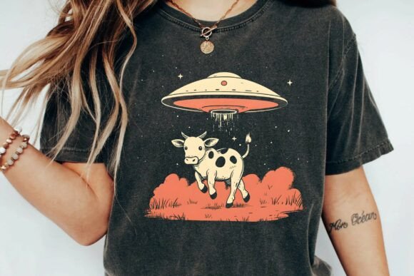 Unleashing Retro Charm: The Vintage Alien Cow Abduction Graphic